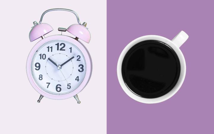 Clock and coffee on a purple background